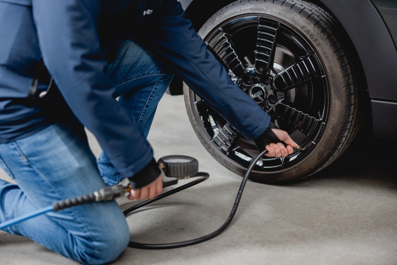 Man next to a tyre